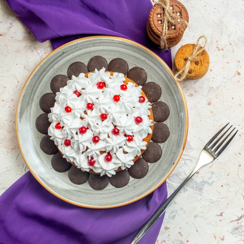 top-view-cake-with-pastry-cream-oval-plate-purple-shawl-cookies-tied-with-rope-fork-notebook (1) top-view-cake-with-pastry-cream-oval-plate-purple-shawl-cookies-tied-with-rope-fork-notebook (1)